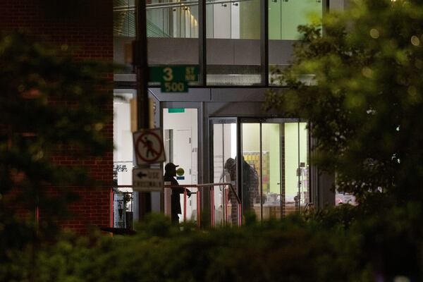 Law enforcement work the scene after two staff members of the Israeli Embassy in Washington were shot and killed outside the Capital Jewish Museum, Thursday, May 22, 2025, in Washington. (AP Photo/Rod Lamkey, Jr.)