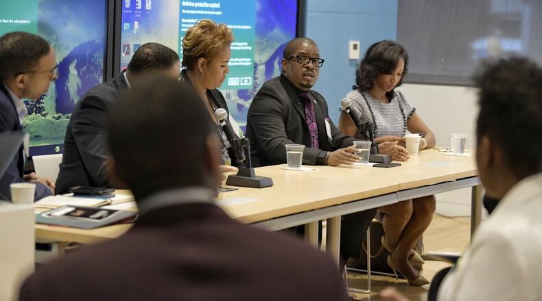 Marco Clark of Richard Wright Public Charter School for Journalism and Media Arts (center), said educators have to have honest conversations about their students and efforts to educate them. PHOTO COURTESY JARRAD HENDERSON