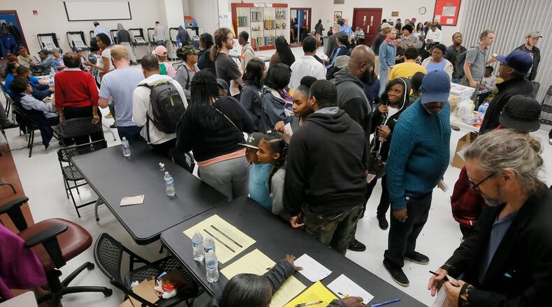 11/6/18 - Atlanta - The wait time to vote at the Pittman Park precinct in Atlanta was reported to be three hours. Pizza and snacks were donated for the people waiting in line. BOB ANDRES / BANDRES@AJC.COM