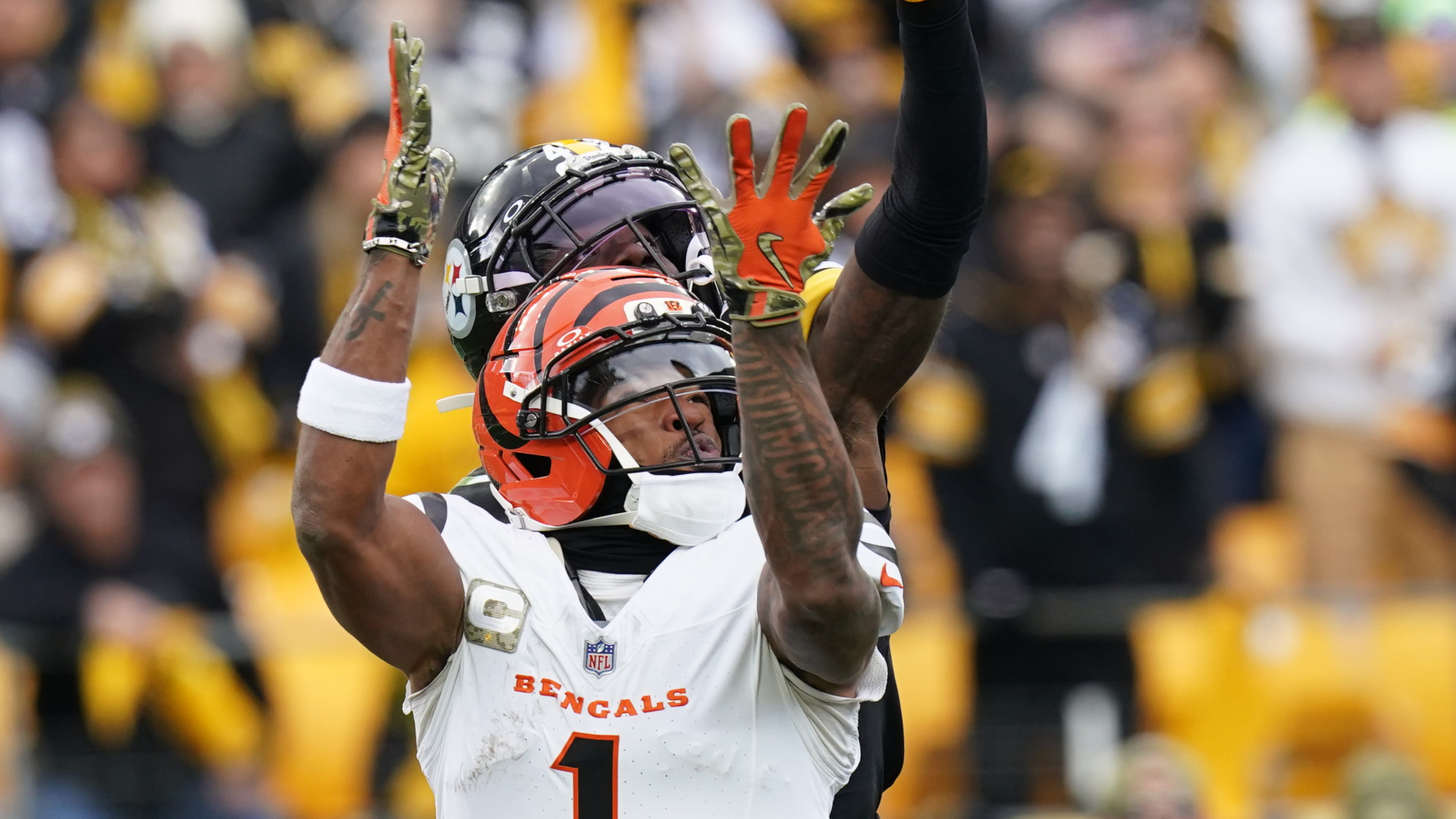 Pittsburgh Steelers cornerback James Pierre (42) breaks up a pass intended for Cincinnati Bengals wide receiver Ja'Marr Chase (1) during the first half of an NFL football game Sunday, Nov. 16, 2025, in Pittsburgh. (AP Photo/Matt Freed)