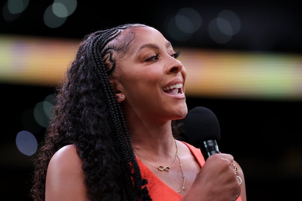 Former Los Angeles Sparks player Candace Parker speaks during her jersey retirement ceremony during a WNBA basketball game between the Sparks and the Chicago Sky, Sunday, June 29, 2025, in Los Angeles. (AP Photo/Jessie Alcheh)