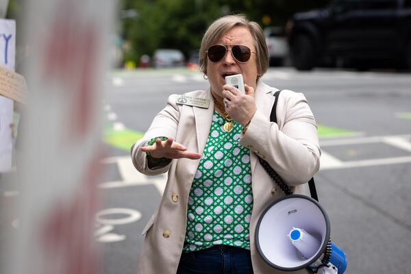 State Rep. Karen Lupton, D-Chamblee, spoke against the elimination of DEI programs at Kennesaw State University at a rally in Atlanta in May. 