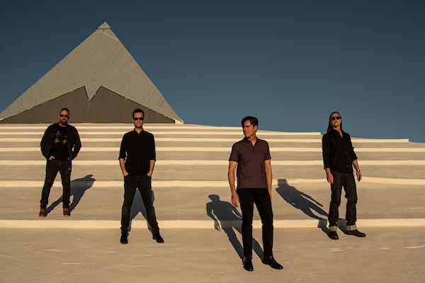 Instead of releasing albums, Jimmy Eat World has put out a trio of singles in recent years. "We’d never done that before and we wanted to see if we could meet listeners where they’re at," said singer-guitarist Jim Adkins (front). (Courtesy of Jimi Giannatti)