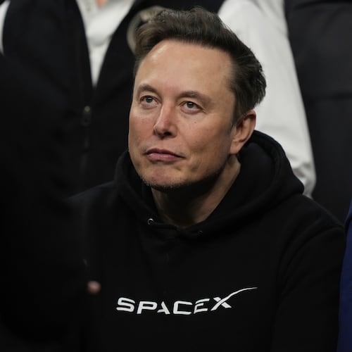 FILE - Elon Musk attends the finals for the NCAA wrestling championship, March 22, 2025, in Philadelphia. (AP Photo/Matt Rourke, File)