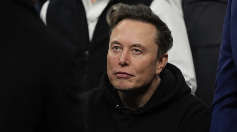 FILE - Elon Musk attends the finals for the NCAA wrestling championship, March 22, 2025, in Philadelphia. (AP Photo/Matt Rourke, File)