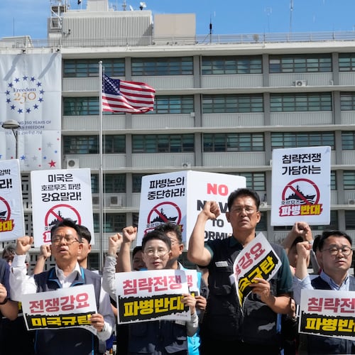 Protesters stage a rally against the possible deployment of South Korean troops to the Strait of Hormuz and a U.S. demand for the deployment, near the U.S. Embassy in Seoul, South Korea, Thursday, Sept. 17, 2026. The banners read ''Oppose troop deployment.'' (AP Photo/Ahn Young-joon)