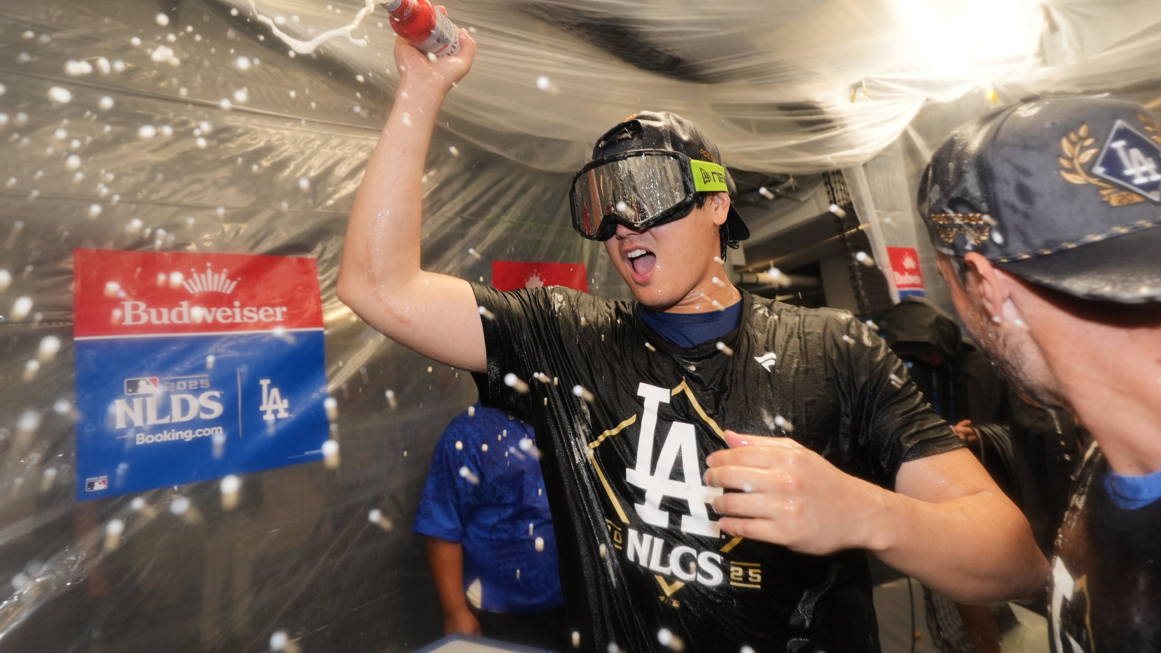 Los Angeles Dodgers' Shohei Ohtani celebrates after his team's win over the Philadelphia Phillies in Game 4 of baseball's National League Division Series Thursday, Oct. 9, 2025, in Los Angeles. (AP Photo/Jae C. Hong)