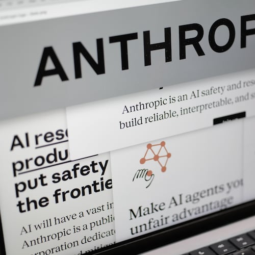 Pages from the Anthropic website and the company's logo are displayed on a computer screen in New York on Thursday, Feb. 26, 2026. (AP Photo/Patrick Sison)