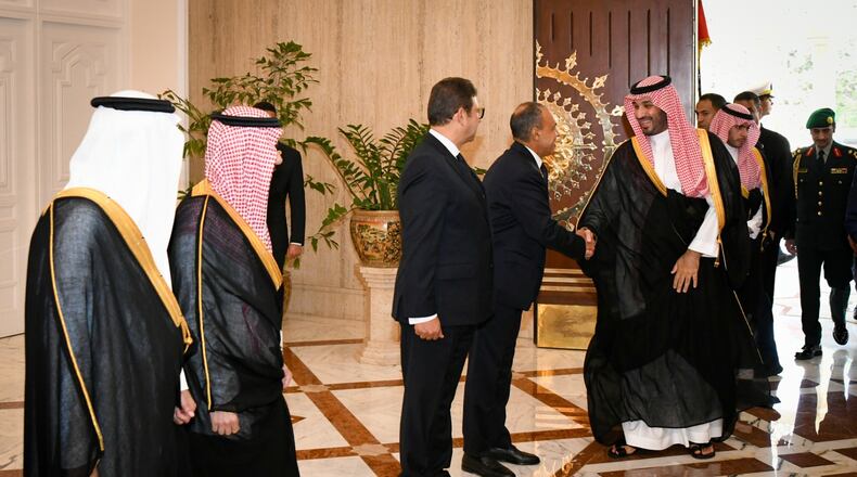 In this photo provided by the Egyptian Presidential Press Office, Saudi Crown Prince Mohammed bin Salman, center right, greets Egyptian officials at the Presidential Palace in Cairo, Egypt, Tuesday, Sept. 15, 2026. (Egyptian Presidential Press Office via AP)