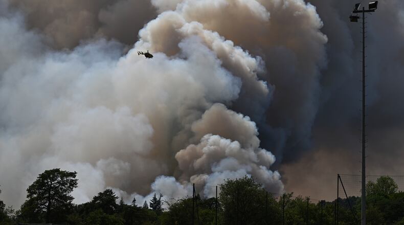FILE - A pyrocumulonimbus, a giant cloud created by a large wildfire is seen in the Fontainebleau forest region, about 60 kilometers (37 miles) south of Paris, France, Monday, July 13, 2026. (AP Photo/Emma Da Silva, File)