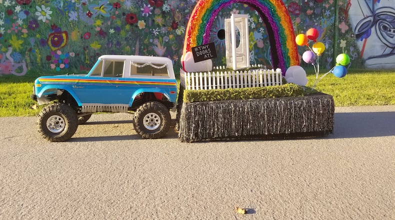 Tiny Doors ATL’s float, pulled by a tiny replica of a 1970 Ford Bronco, out for a trial spin this week. Measuring a mere 36-inches long, the float will be in Sunday’s Atlanta Pride Parade.
