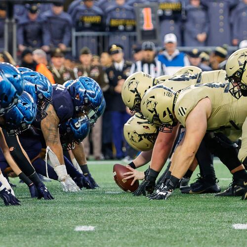 FILE - The Navy, left, and Army line up for the snap at the line of scrimmage during the first quarter of an NCAA football game at Gillette Stadium Saturday, Dec. 9, 2023, in Foxborough, Mass. (AP Photo/Winslow Townson, File)