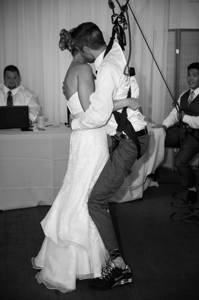 Paraplegic veteran surprises bride by standing for first dance