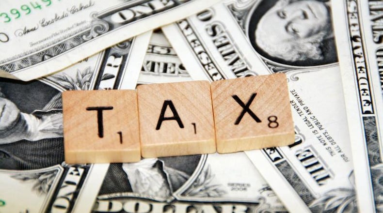 Johns Creek announced reductions in its 2019 millage rates for maintenance and operations and for park bonds, resulting in an overall tax reduction of $2 million. AJC FILE