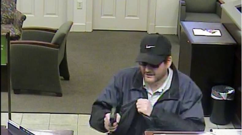 Kevin Ray Williamson is accused of armed robberies between February and September at six banks in Johns Creek, Atlanta and Marietta.