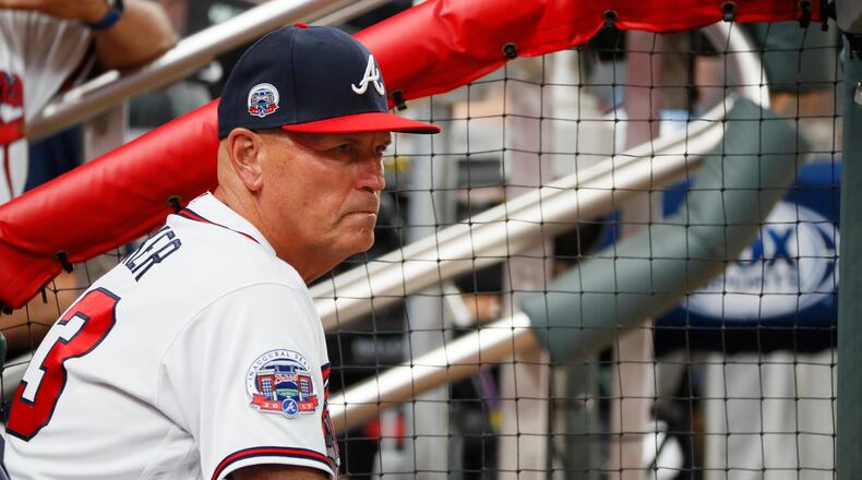 Braves manager Brian Snitker met Saturday with team officials, who say they’ve not decided yet whether to pick up or decline a 2018 option on his contract. (AP Photo/Todd Kirkland)