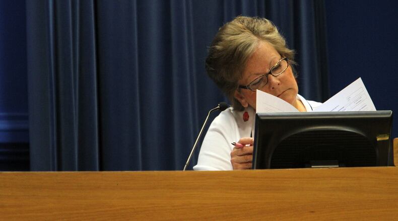 June 12, 2012-Decatur-“The commission is the only authority to prioritize capital projects and spending,” said Commissioner Elaine Boyer, who introduced the resolution. The DeKalb County Commission on Tuesday demanded that the county halt all work being done to clear land for a soapbox derby track and ordered the chief executive to prepare a financial report on all money spent so far on the project. VINO WONG / VWONG@AJC.COM