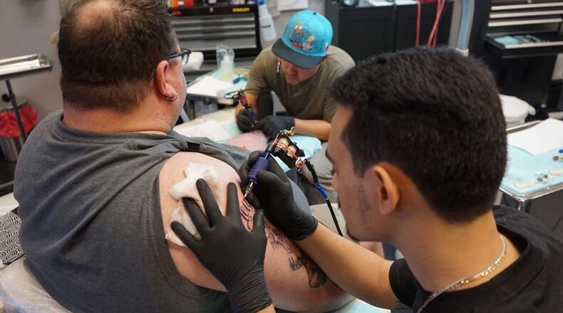 Gwinnett Commissioners renew Saints and Sinners ATL Tattoo and Piercings permit for two more years. Courtesy Saints and Sinners