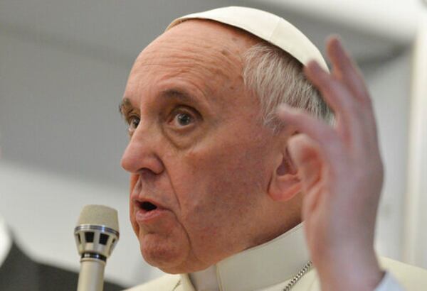 FILE - Pope Francis talks about gays saying he wouldn't judge priests for their sexual orientation in a remarkably open and wide-ranging news conference aboard the papal flight on the journey back from Brazil, Monday, July 29, 2013. (AP Photo/Luca Zennaro, Pool, file)