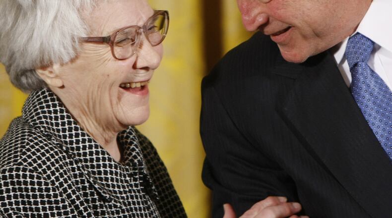 President Bush, right, shares a laugh with author Harper Lee, as he presented her with the Presidential Medal of Freedom during a ceremony in the East Room of the White House in Washington, Monday, Nov. 5, 2007. (AP Photo/Gerald Herbert) Harper Lee is seen here in 2007 receiving the Presidential Medal of Freedom from President George Bush.
