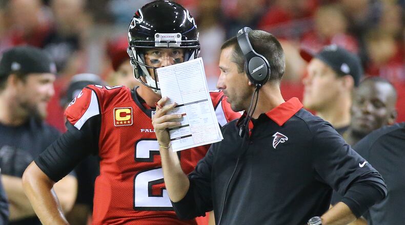 Matt Ryan and offensive coordinator Kyle Shanahan are on the same page, but too many of the quarterback’s passes have been off target. (Curtis Compton / ccompton@ajc.com)