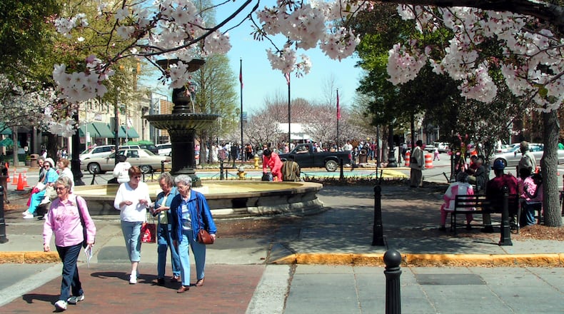 The cherry blossoms form a canopy over Macon’s Third Street Park. Photo by Glenn Grossman.