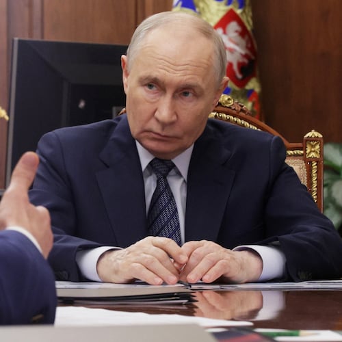 Russian President Vladimir Putin listens to Minister of Industry and Trade Anton Alikhanov during their meeting at the Kremlin in Moscow, Wednesday, Aug. 26, 2026. (Mikhail Metzel, Sputnik, Kremlin Pool Photo via AP)