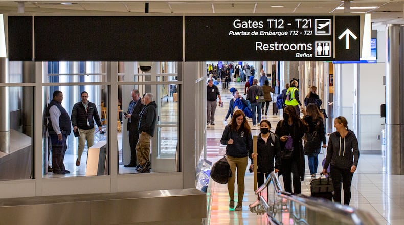 Hartsfield-Jackson Atlanta International Airport on Thursday, Nov 17, 2022.  The area's circular atrium skylight, lounge seating options, large windows and digital information boards provide for United passengers.  (Jenni Girtman for The Atlanta Journal-Constitution)