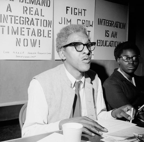 FILE - Bayard Rustin, director of the scheduled school boycott in New York City, is shown during a press conference in the Brooklyn borough, of New York, Feb. 1, 1964. (AP Photo/Jacob Harris, File)
