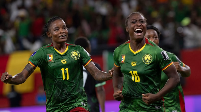 Cameroon's Naomi Leslie Ndjoah Eto, right, celebrates after scoring her team's second goal against Malawi during the Women AFCON 2026 final soccer match, in Rabat, Morocco, Sunday, Aug. 16, 2026. (AP Photo)