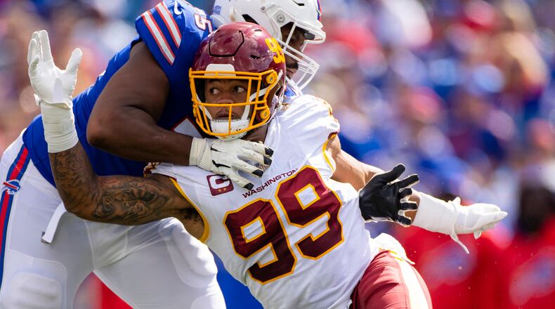 Washington Football Team defensive end Chase Young (99) rushes against the Buffalo Bills during the second quarter Sunday, Sept. 26, 2021, in Orchard Park, N.Y. (Brett Carlsen/AP)