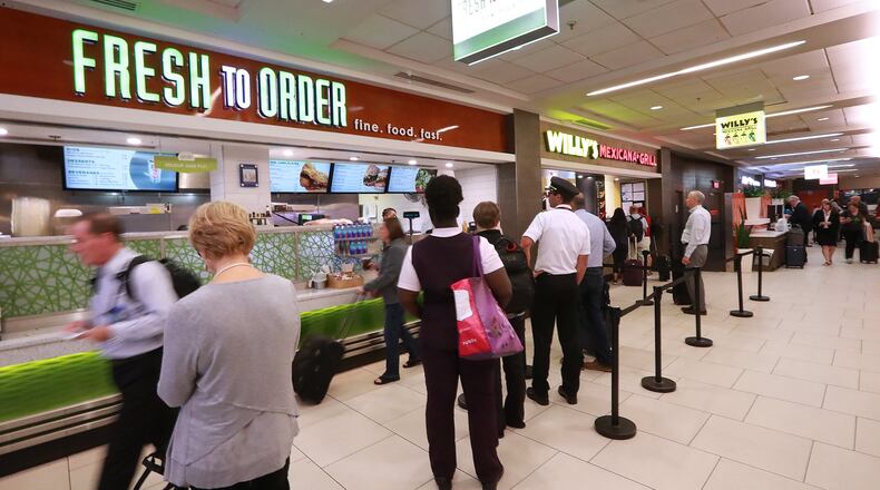 Multiple restaurants line Concourse B at Hartsfield-Jackson. Curtis Compton/ccompton@ajc.com