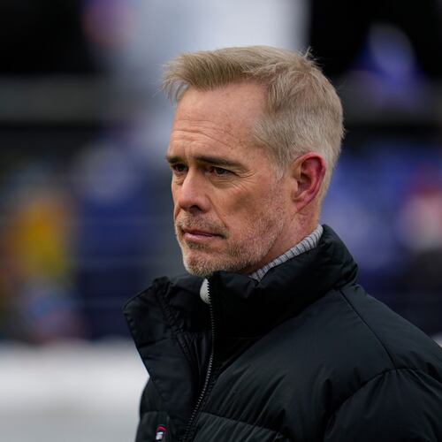 FILE - ESPN broadcaster Joe Buck walks the field before an NFL football AFC divisional playoff game between the Baltimore Ravens and the Houston Texans, Jan. 20, 2024, in Baltimore. (AP Photo/Julio Cortez, File)