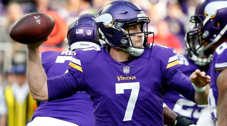Minnesota Vikings quarterback Case Keenum throws a pass during the first half of an NFL football game against the Chicago Bears, Sunday, Dec. 31, 2017, in Minneapolis. (AP Photo/Bruce Kluckhohn)