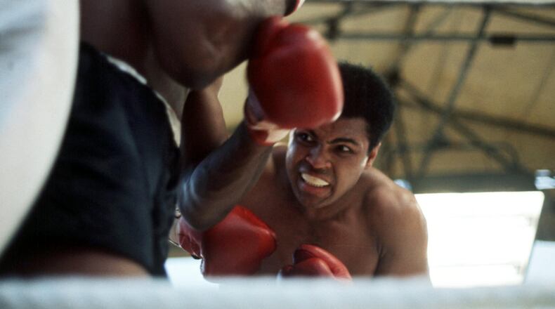 Muhammad Ali in action against Al "Blue" Lewis in Dublin, Ireland in 1972.