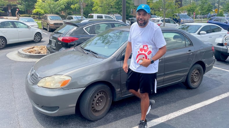 Brandon Carver, an Uber Eats driver, says a homeowner in Buckhead threatened him with a shotgun when he tried to deliver food to the wrong house. Photo by Bill Torpy