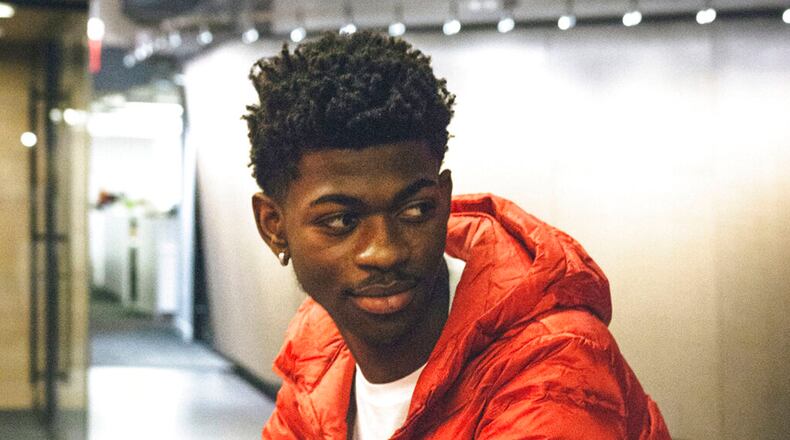 This undated image provided by Columbia Records shows rapper Lil Nas X, whose viral hit "Old Town Road" was removed from Billboard's country charts because they said it wasn't country enough.