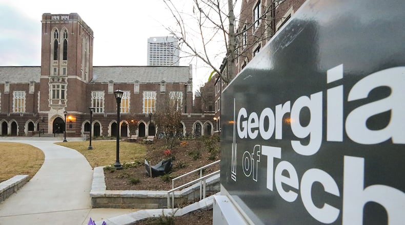 December 9, 2014 Atlanta: A Georgia Tech student walks towards the front of Brittain Dining Hall on the Georgia Tech campus Tuesday, Dec. 9, 2014.