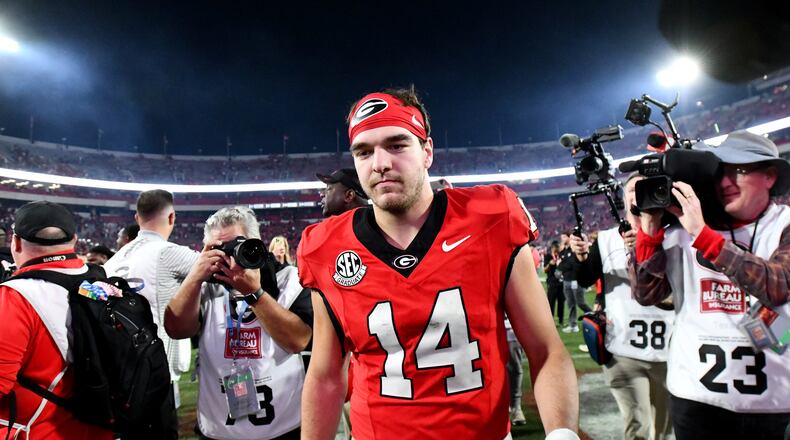 Georgia quarterback Gunner Stockton leaves after Georgia beat Texas during an NCAA football game at Sanford Stadium, Saturday, Nov. 15, 2025, in Athens. Georgia won 35-10 over Texas. (Hyosub Shin/AJC)