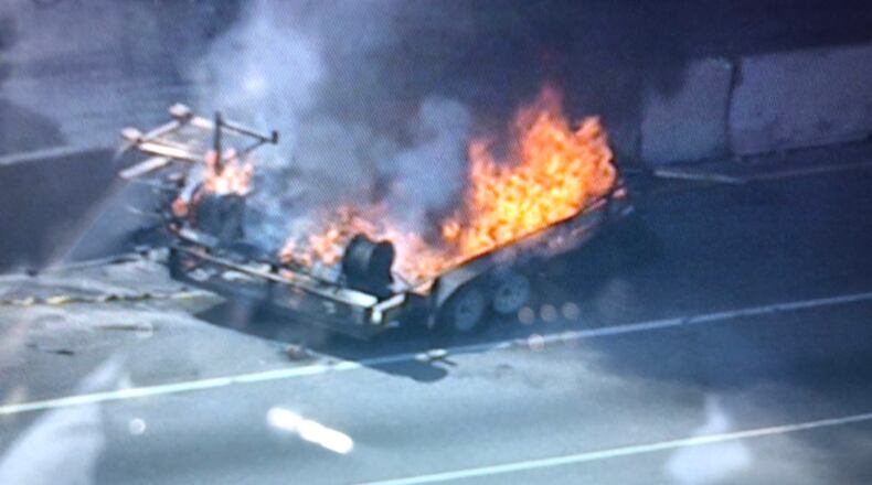 This trailer fire earlier closed lanes on I-285 near Flat Shoals Road.