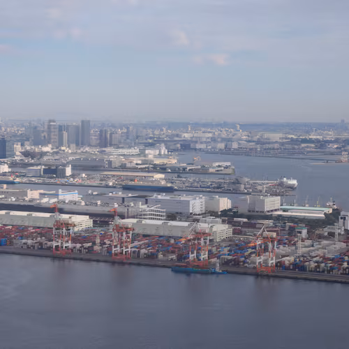 FILE - A container port is seen from a helicopter in Tokyo, Oct. 29, 2025. (AP Photo/Mark Schiefelbein, File)