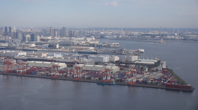 FILE - A container port is seen from a helicopter in Tokyo, Oct. 29, 2025. (AP Photo/Mark Schiefelbein, File)