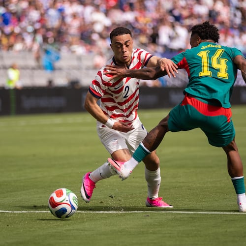 United States defender Sergiño Dest (left) battles with Senegal midfielder Ismail Jakobs during an international friendly Sunday, May 31, 2026, in Charlotte, N.C. (Scott Kinser/AP)