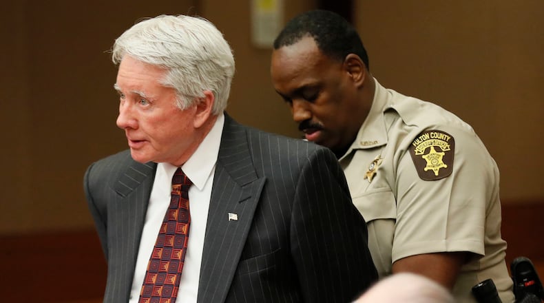 4/23/18 - Atlanta - After the verdict, Tex McIver is handcuffed and taken into custody. The jury found Tex McIver guilty on four of five charges on April 23, their fifth day of deliberations at the Fulton County Courthouse. Bob Andres bandres@ajc.com