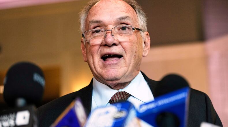 FILE - Jim Troupis reads a statement after his court appearance outside a Dane County courtroom Dec. 12, 2024, in Madison, Wis. (AP Photo/Morry Gash, File)