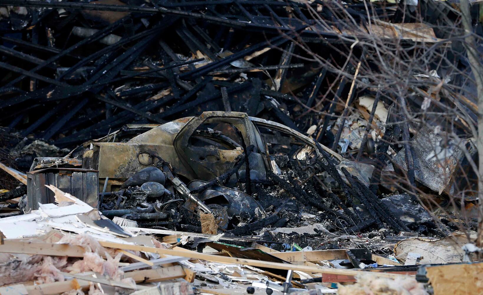 2 die, 2 homes gone, dozens damaged