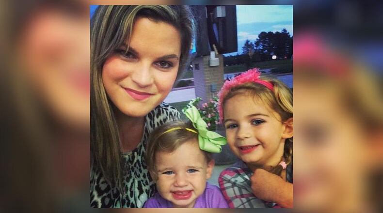 Jennifer Rosenbaum, left, is shown with sisters Laila and Millie in an undated photo.