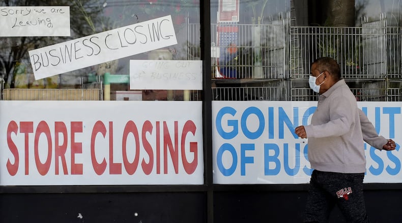 While the economy added jobs in May, many are workers going back to reopened stores and restaurants. But if consumers won’t return to spend money, those jobs may not last. (AP Photo/Nam Y. Huh, File)