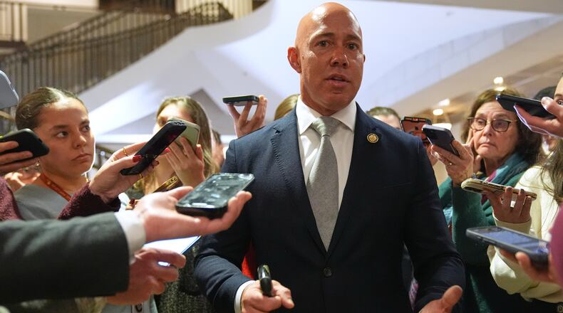 Rep. Brian Mast, R-Fla., speaks to reporters at the U.S. Capitol Monday, Jan. 5, 2026, in Washington, after a closed-door briefing about President Donald Trump directing U.S. forces to capture Venezuelan President Nicolas Maduro. (AP Photo/Jacquelyn Martin)