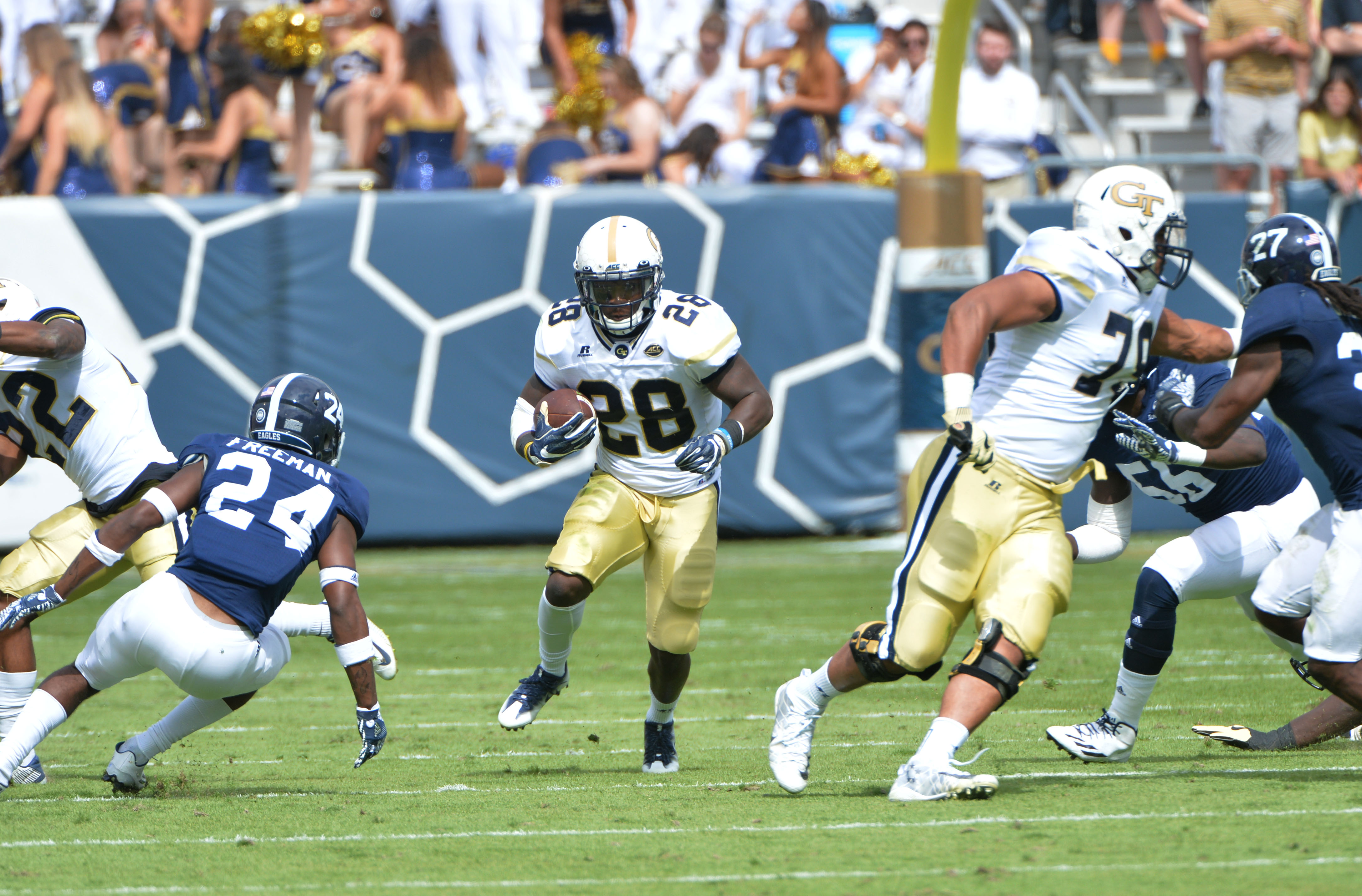 Georgia Tech running back J.J. Green (28) runs against Georgia Southern defensive back Sean Freeman (24) in the first half at Bobby Dodd Stadium on Saturday, October 15, 2016. HYOSUB SHIN / HSHIN@AJC.COM